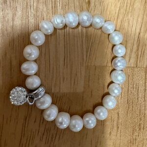 Elegant Pearl Bracelet with Silver Charm
